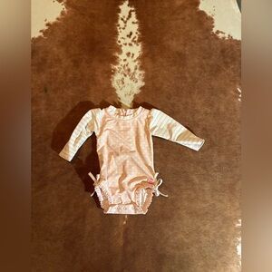RuffleButts swimsuit
size 6-12 month girls
